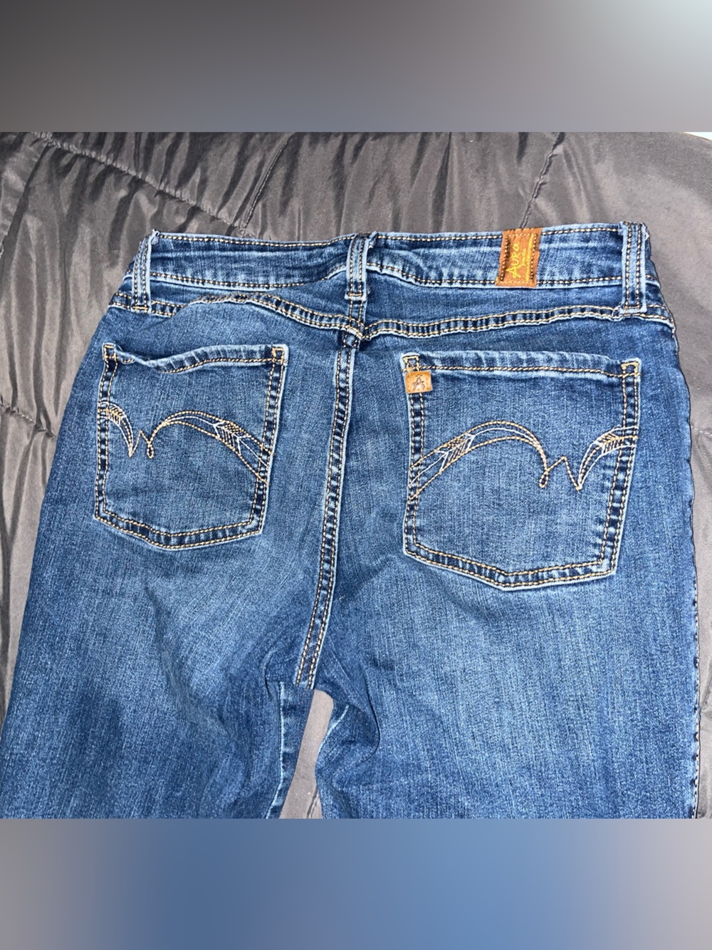 Aura by wrangler, size 4 bootcut jean